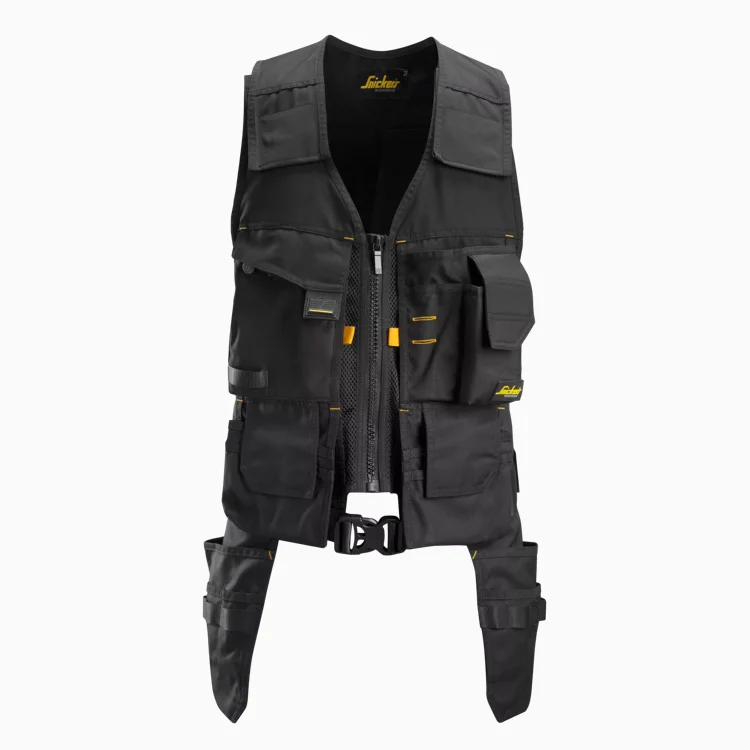 Black tactical utility vest with multiple pockets, zippers, and adjustable waist straps.