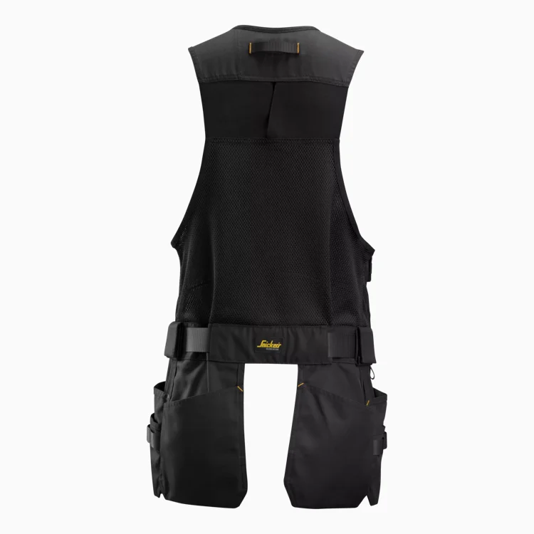Back view of a black tactical vest with a mesh back panel, large cargo pockets, and adjustable waist straps
