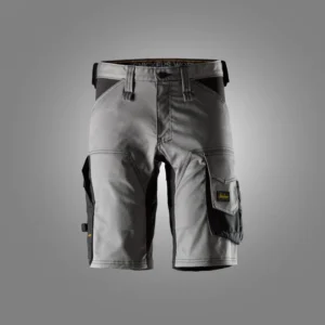 Grey cargo shorts with black side panels, belt loops, and a yellow brand patch on the right pocket.