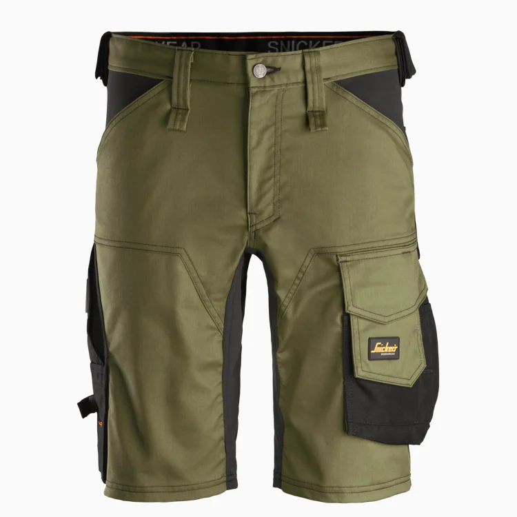 Olive green cargo shorts with black side panels and a large flap pocket on the right leg, shown from the front.