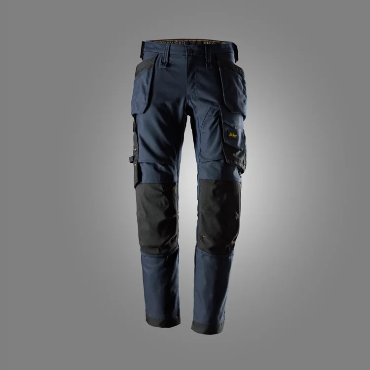Rugged navy and black cargo hiking pants with multiple side pockets and reinforced knee areas.
