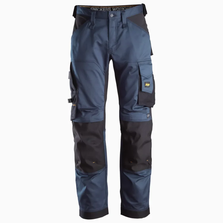 Snickers Workwear cargo work pants in blue and black with multiple pockets and reinforced knees.