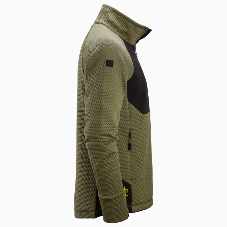 Olive-green textured fleece jacket with a black chest panel, shown from the side with a high collar and zip pocket details on the front.